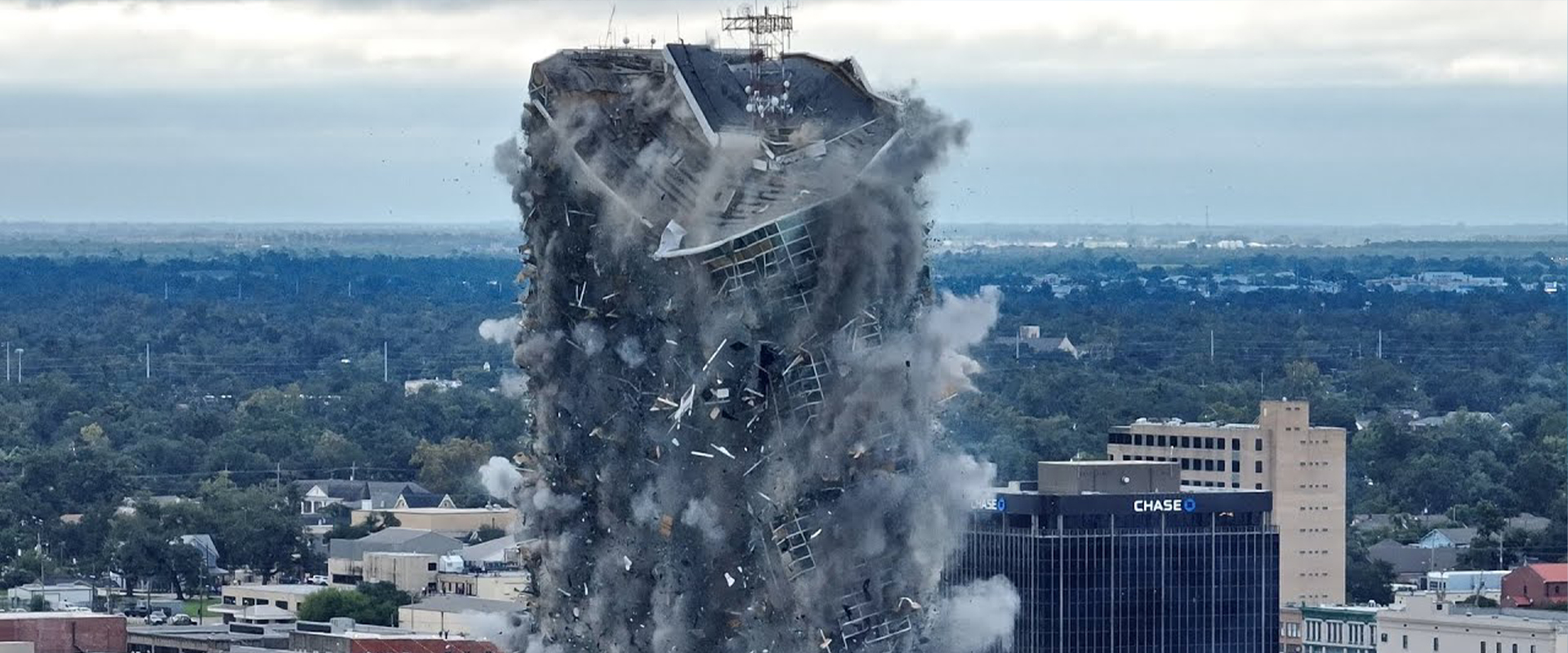 Controlled demolition of structure in progress
