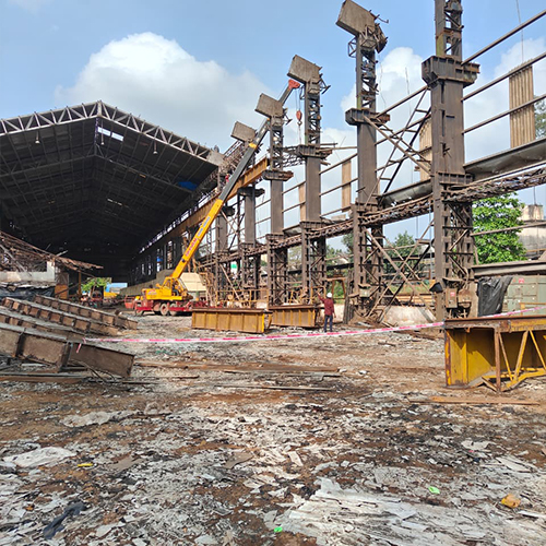 High-rise building demolition site photo