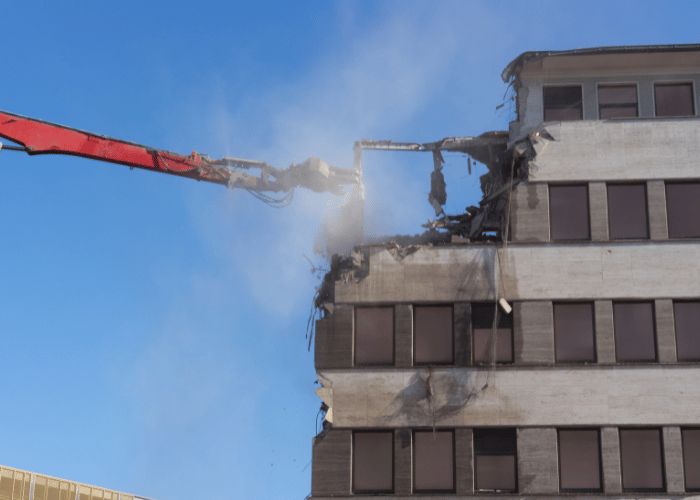 Demolition site with heavy machinery in operation