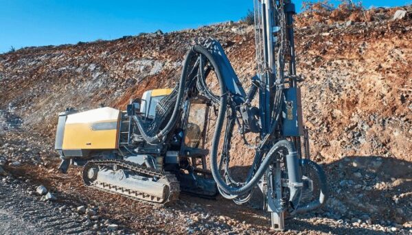 Core drilling into concrete structure